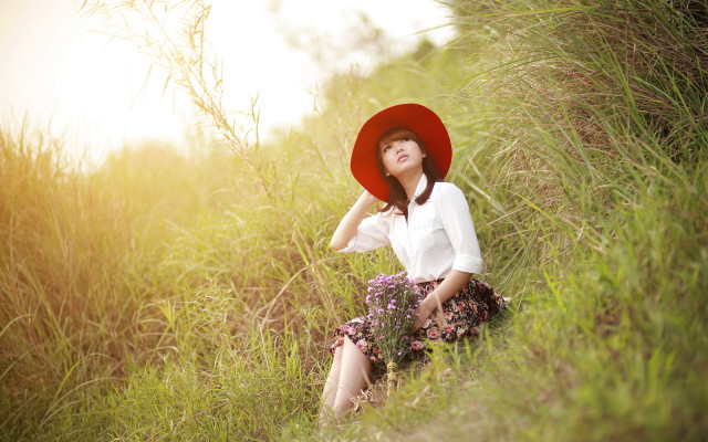Woman red hat tall grass free wallpaper for desktop - medium preview image
