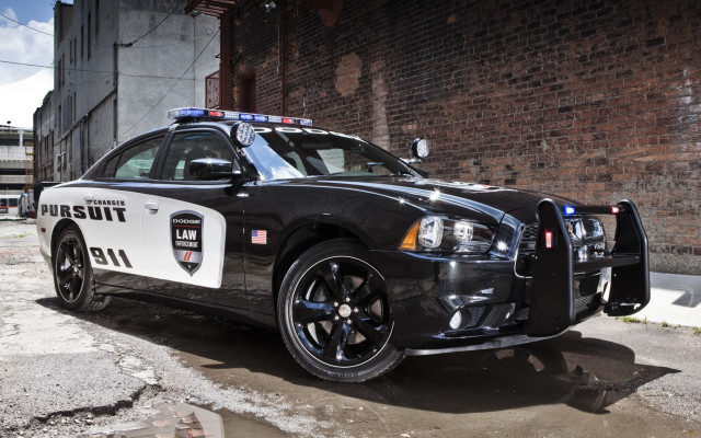 Police car brick building police #2 free wallpaper for desktop - medium preview image