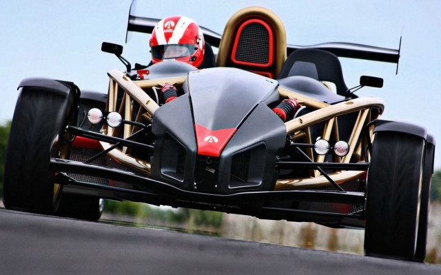 Large front wheel car movement free wallpaper for desktop - medium preview image