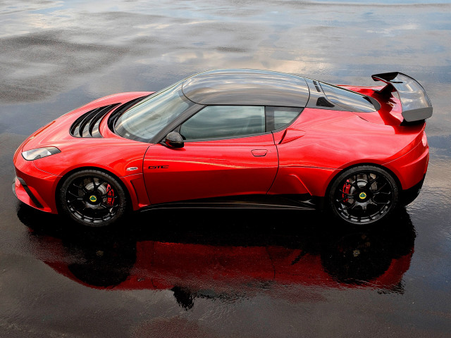 Red sports car wet ground free wallpaper for desktop - medium preview image