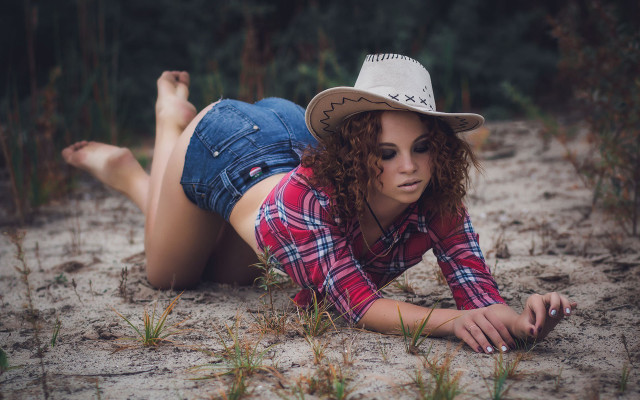 Desert cowgirl laying plaid denim free wallpaper for desktop - medium preview image