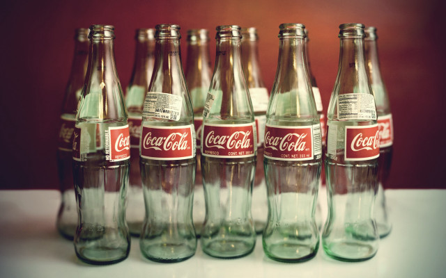 Coca cola bottles table top free wallpaper for desktop - medium preview image