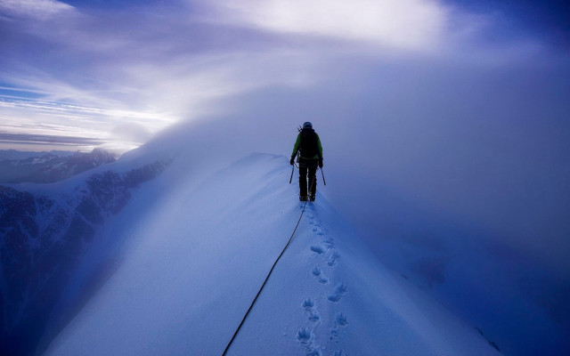 Mountain skiing snowy sky clouds free wallpaper for desktop - medium preview image