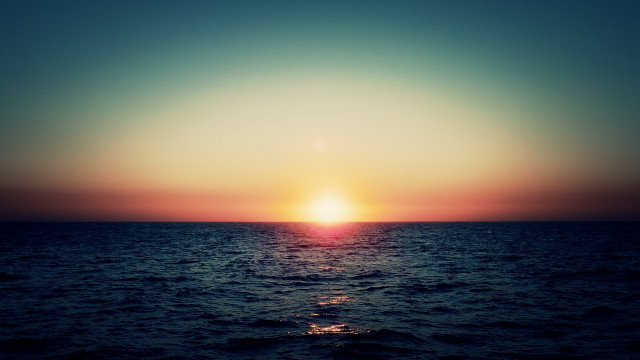Sunset ocean boat sky horizon free wallpaper for desktop - medium preview image