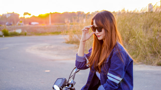 Red haired girl motorcycle sunset free wallpaper for desktop - medium preview image