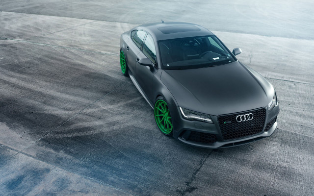 Black car green rims concrete free wallpaper for desktop - medium preview image