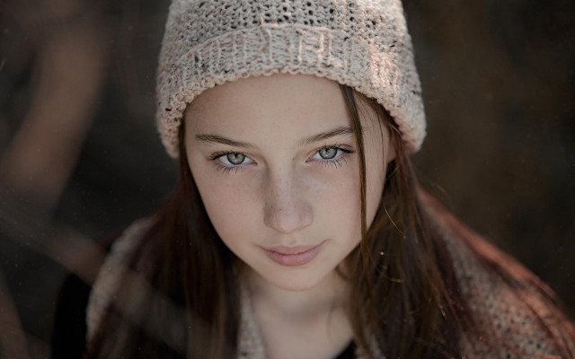 Young girl knitted hat serious free wallpaper for desktop - medium preview image