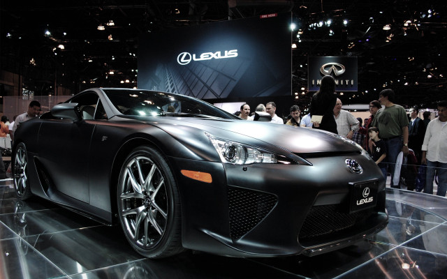 Lotus showroom people blonde brown free wallpaper for desktop - medium preview image