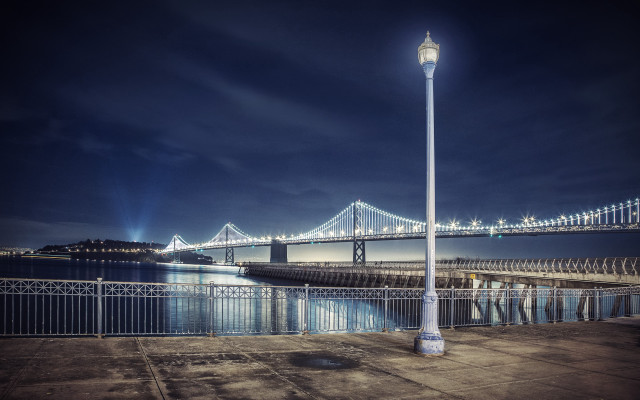 Streetlight bridge water night cityscape free wallpaper for desktop - medium preview image