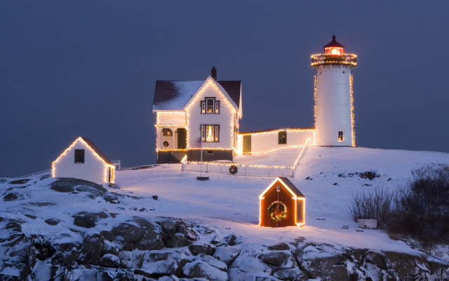 Lighthouse christmas snowy hill sunset free wallpaper for desktop - medium preview image