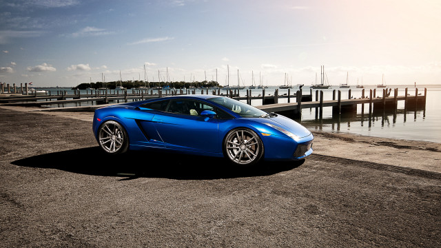 Blue sports car dock boat free wallpaper for desktop - medium preview image