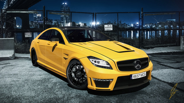 Yellow sports car night cityscape free wallpaper for desktop - medium preview image