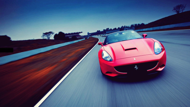 Red sports car night motion free wallpaper for desktop - medium preview image