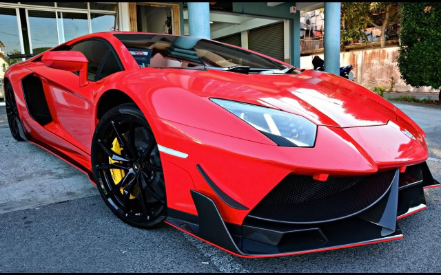 Red sports car man driver free wallpaper for desktop - medium preview image