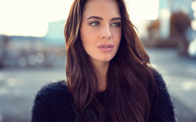 Woman long hair black sweater free wallpaper for desktop - medium preview image