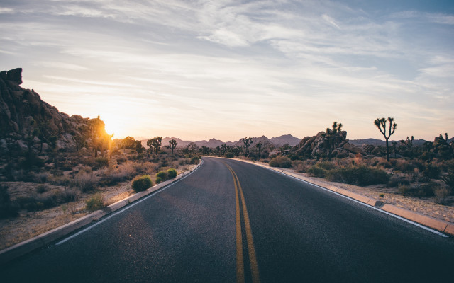 Mountain road sunset clouds city free wallpaper for desktop - medium preview image