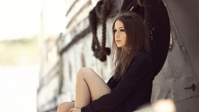 Woman sitting wall clock outdoor free wallpaper for desktop - medium preview image