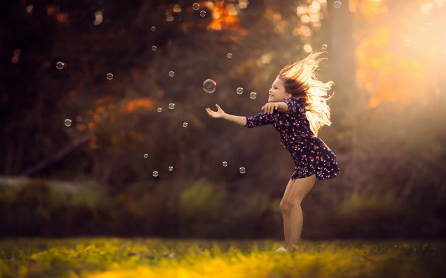 Girl bubbles field outdoors sunset free wallpaper for desktop - medium preview image