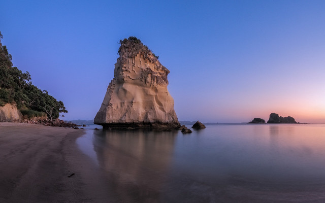 Rock outcrop water beach sunset free wallpaper for desktop - medium preview image