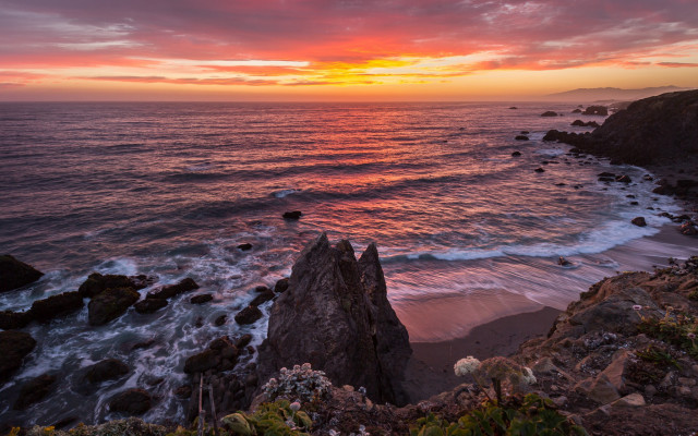 Sunset ocean rocky shore cliff free wallpaper for desktop - medium preview image