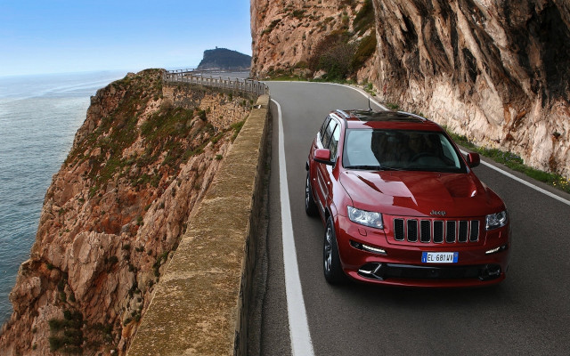 Red jeep cliff road ocean free wallpaper for desktop - medium preview image