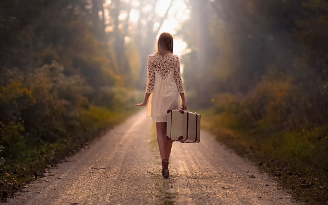 Woman walking dirt road suitcase #2 free wallpaper for desktop - medium preview image