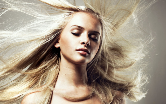 Woman blowing wind fur coat free wallpaper for desktop - medium preview image