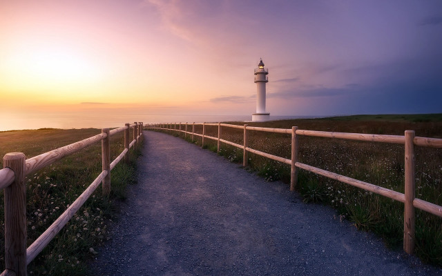 Lighthouse sunset path fence hill free wallpaper for desktop - medium preview image
