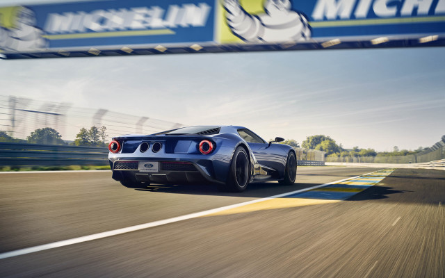 Blue sports car race track free wallpaper for desktop - medium preview image