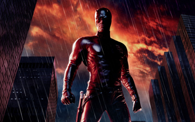 Red suit man rainy city free wallpaper for desktop - medium preview image