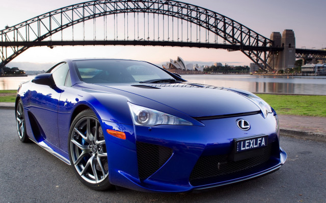 Blue sports car bridge background free wallpaper for desktop - medium preview image