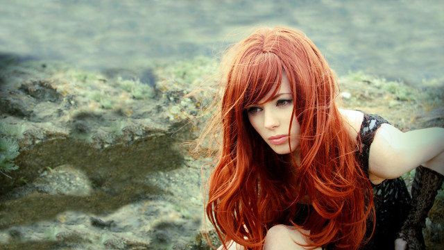 Red haired woman posing field free wallpaper for desktop - medium preview image