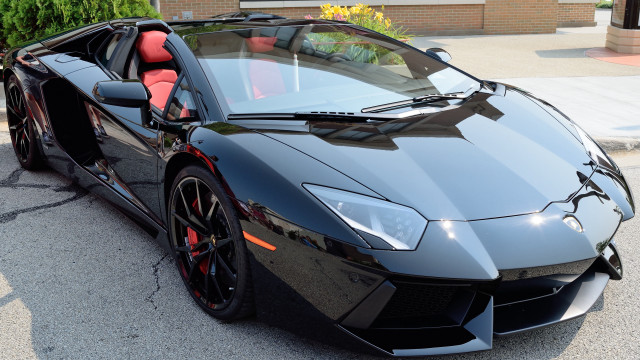 Black sports car red seat free wallpaper for desktop - medium preview image