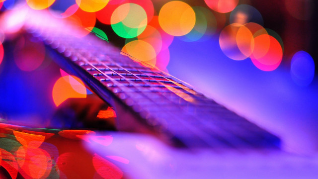 Guitar neck bokeh lensflare sky free wallpaper for desktop - medium preview image