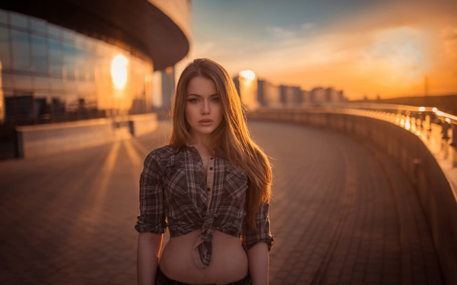 Woman sunset building anamorphic flare free wallpaper for desktop - medium preview image