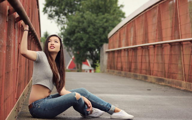 Woman brick wall sitting outdoors free wallpaper for desktop - medium preview image