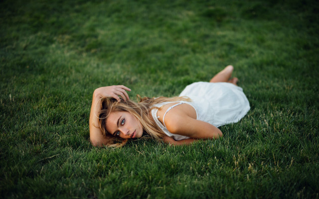 Woman white dress laying grass free wallpaper for desktop - medium preview image