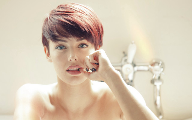 Woman finger piercing mirror redhair free wallpaper for desktop - medium preview image