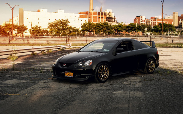 Black car parking lot cityscape free wallpaper for desktop - medium preview image