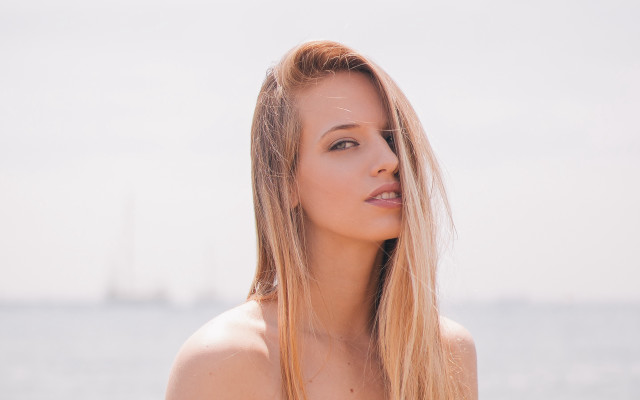 Blonde woman ocean sailboat sunny free wallpaper for desktop - medium preview image