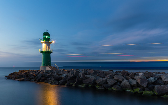 Lighthouse rocky shore night longexposure free wallpaper for desktop - medium preview image