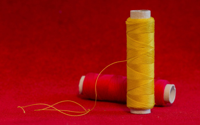 Spool thread red background triadic free wallpaper for desktop - medium preview image