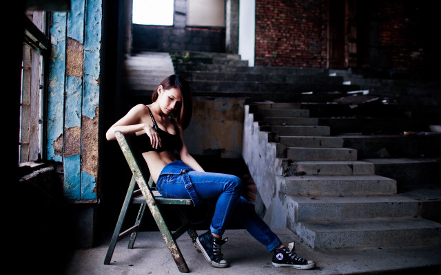 Woman sitting ruined building denim free wallpaper for desktop - medium preview image