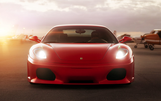 Red sports car plane person free wallpaper for desktop - medium preview image