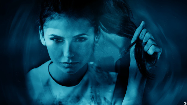 Woman holding hair serious blue free wallpaper for desktop - medium preview image