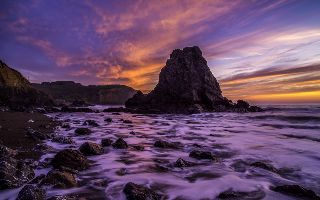 Rocky beach sunset mountain clouds free wallpaper for desktop - medium preview image