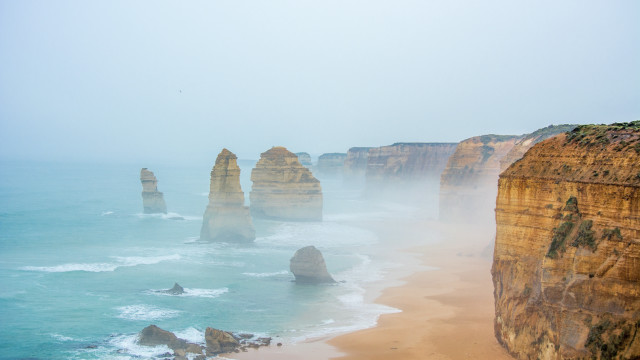 Foggy beach ocean cliffs volumetric free wallpaper for desktop - medium preview image