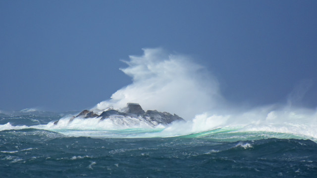 Large wave rock ocean blue free wallpaper for desktop - medium preview image