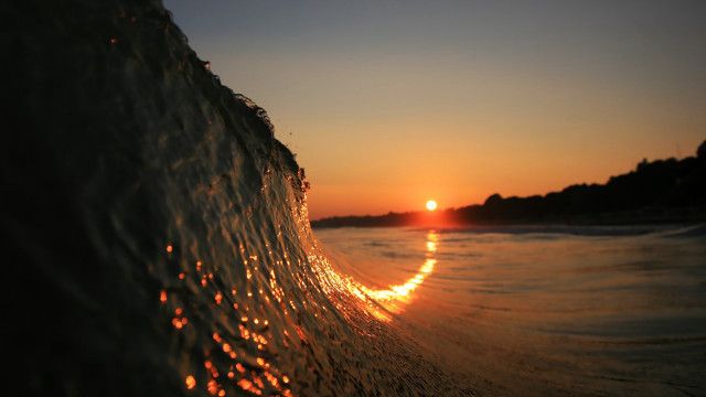 Wave sunset beach city lights free wallpaper for desktop - medium preview image
