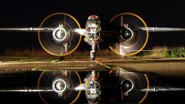 Plane runway night lights reflection free wallpaper for desktop - medium preview image